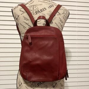 Tignanello 100% leather backpack. Wine in color